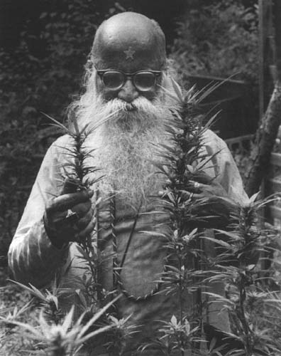 Hindu ascetic admiring his sacraments